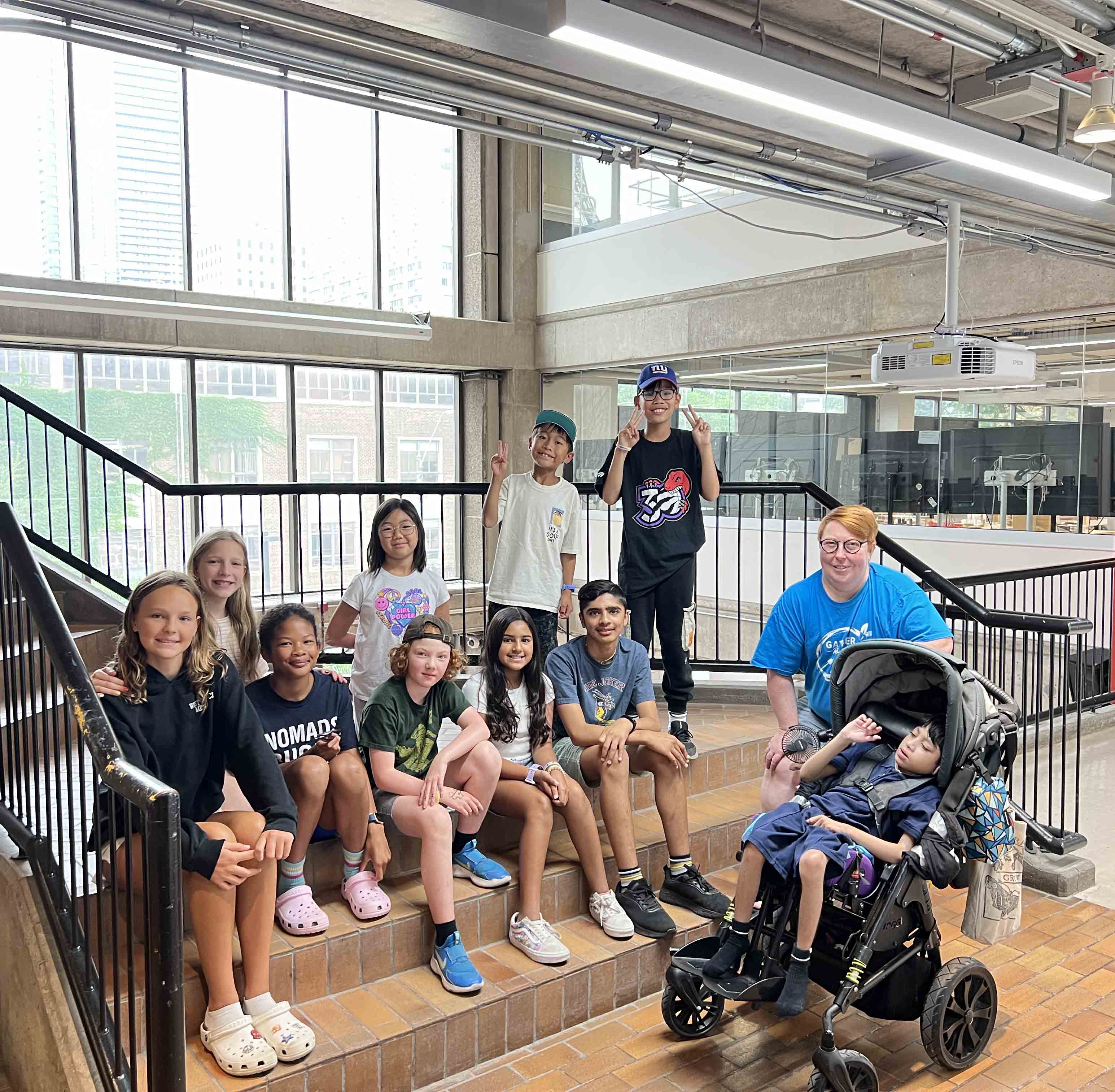Campers sitting on stairs.