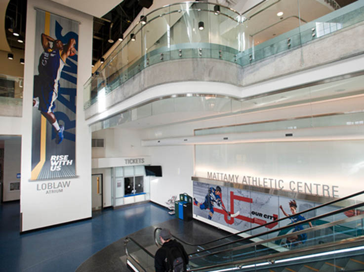 An escalator leading to the second floor of the Mattamy Athletic Centre