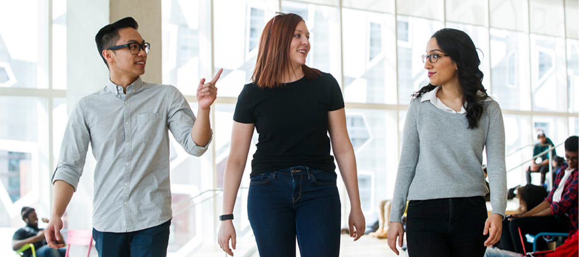 Three students walking 