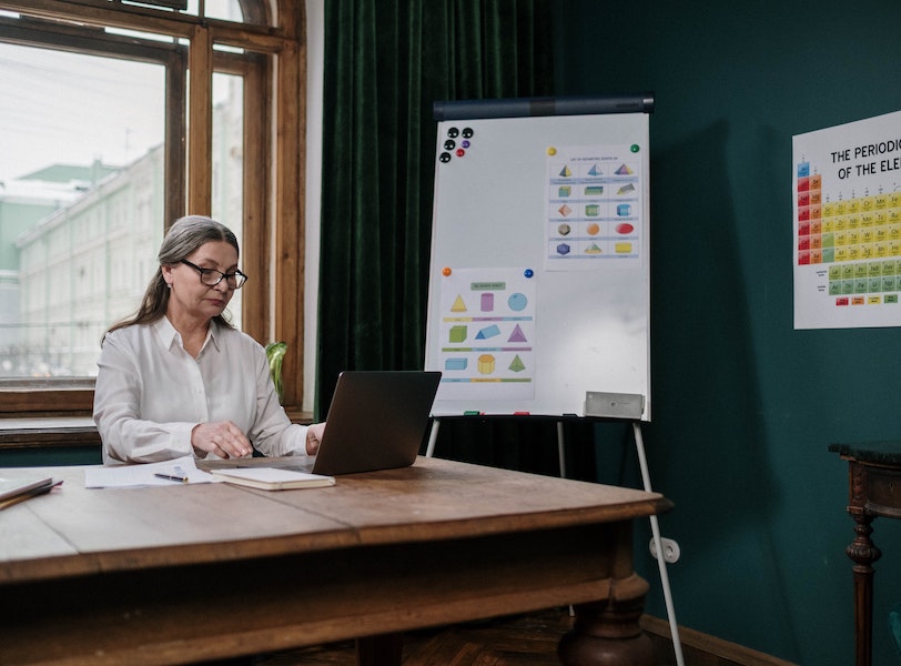 Female faculty member attending an online workshop