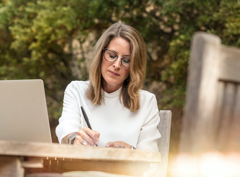 Female faculty member attending an online workshop