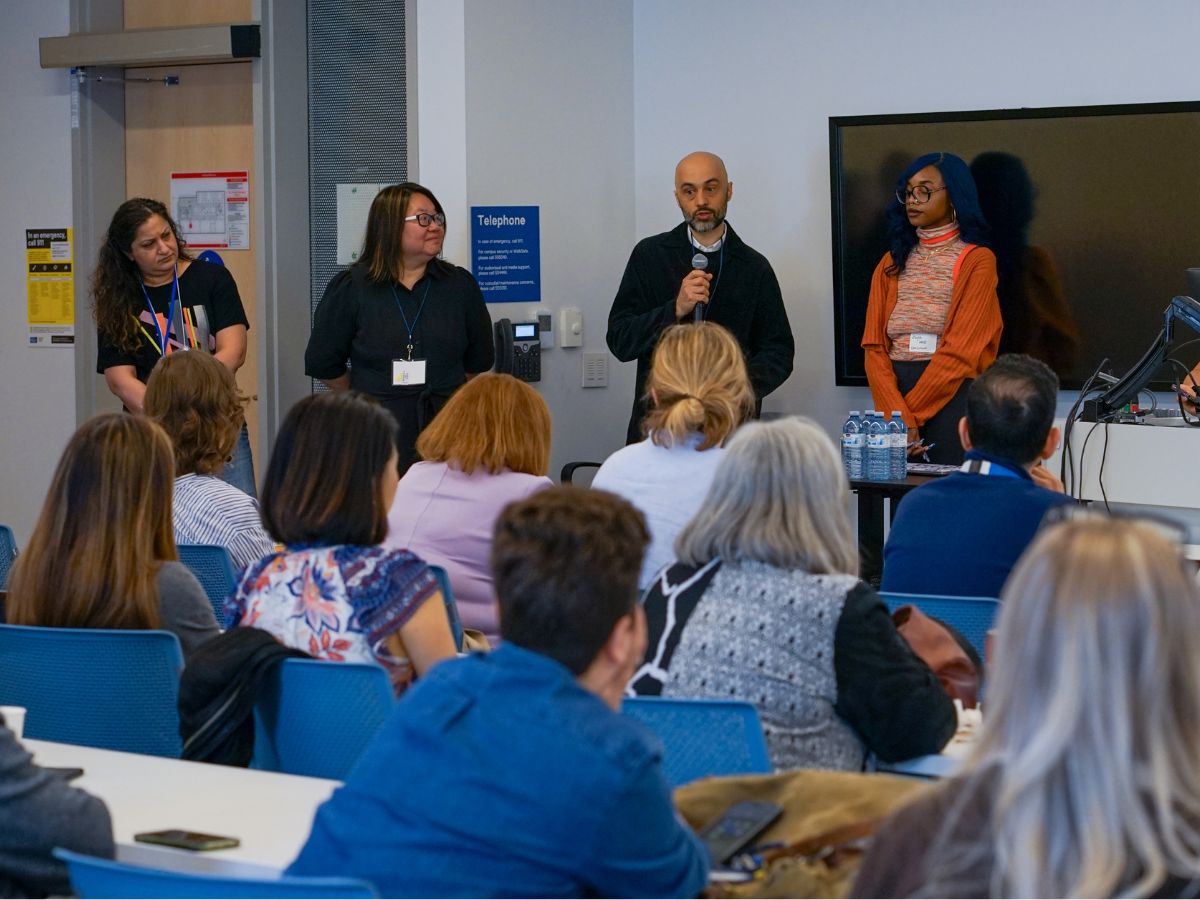 Concurrent session presenters stand in front of an audience in a classroom at the 2025 Learning and Teaching Conference.