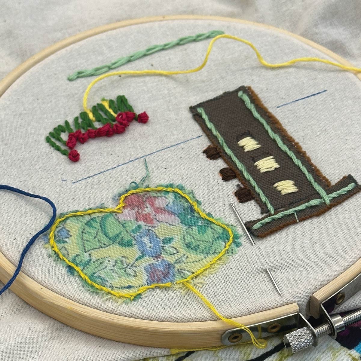 Embroidery hoop with building textile