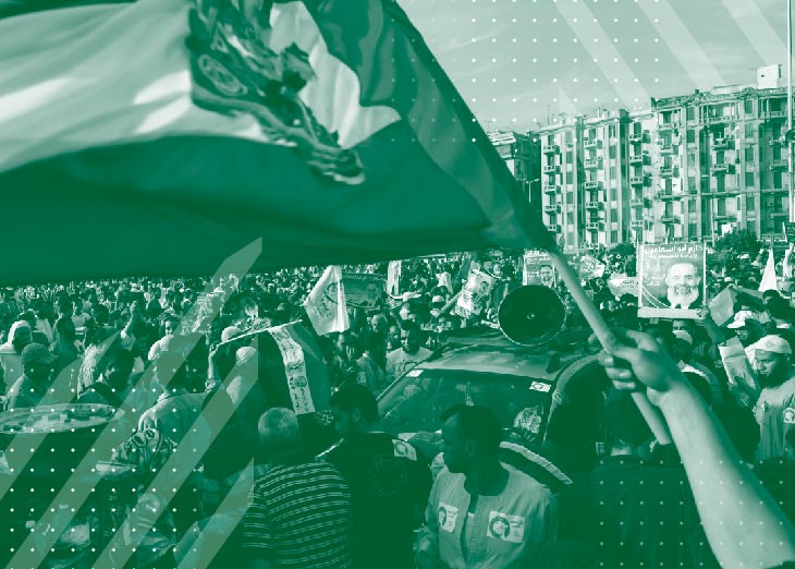 Large crowd of people at a rally on Tahrir Square in Cairo