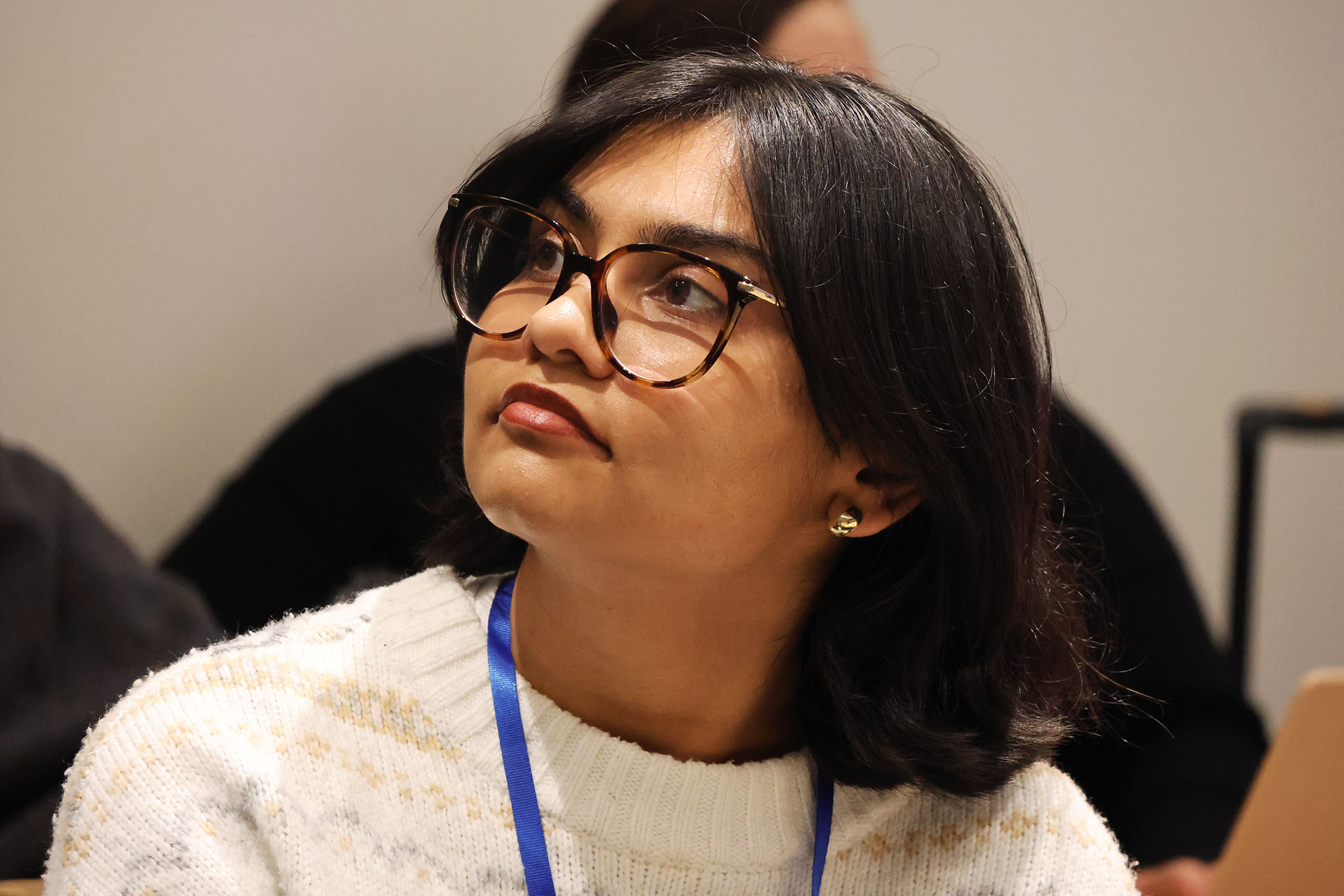 Winter School participants sitting in a conference room