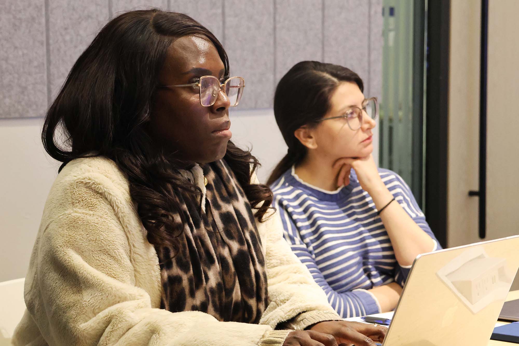 Winter School participants sitting in a conference room