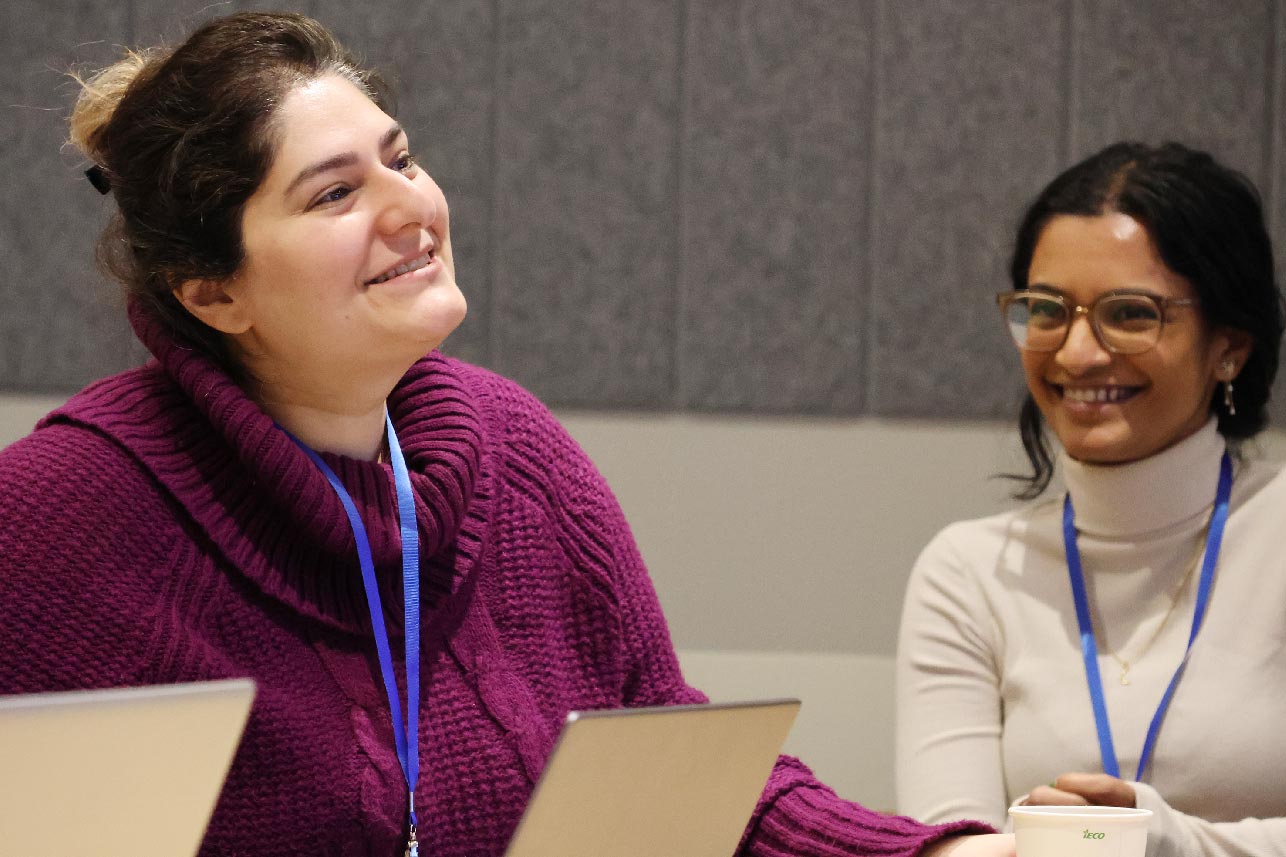 Winter School participants sitting in a conference room
