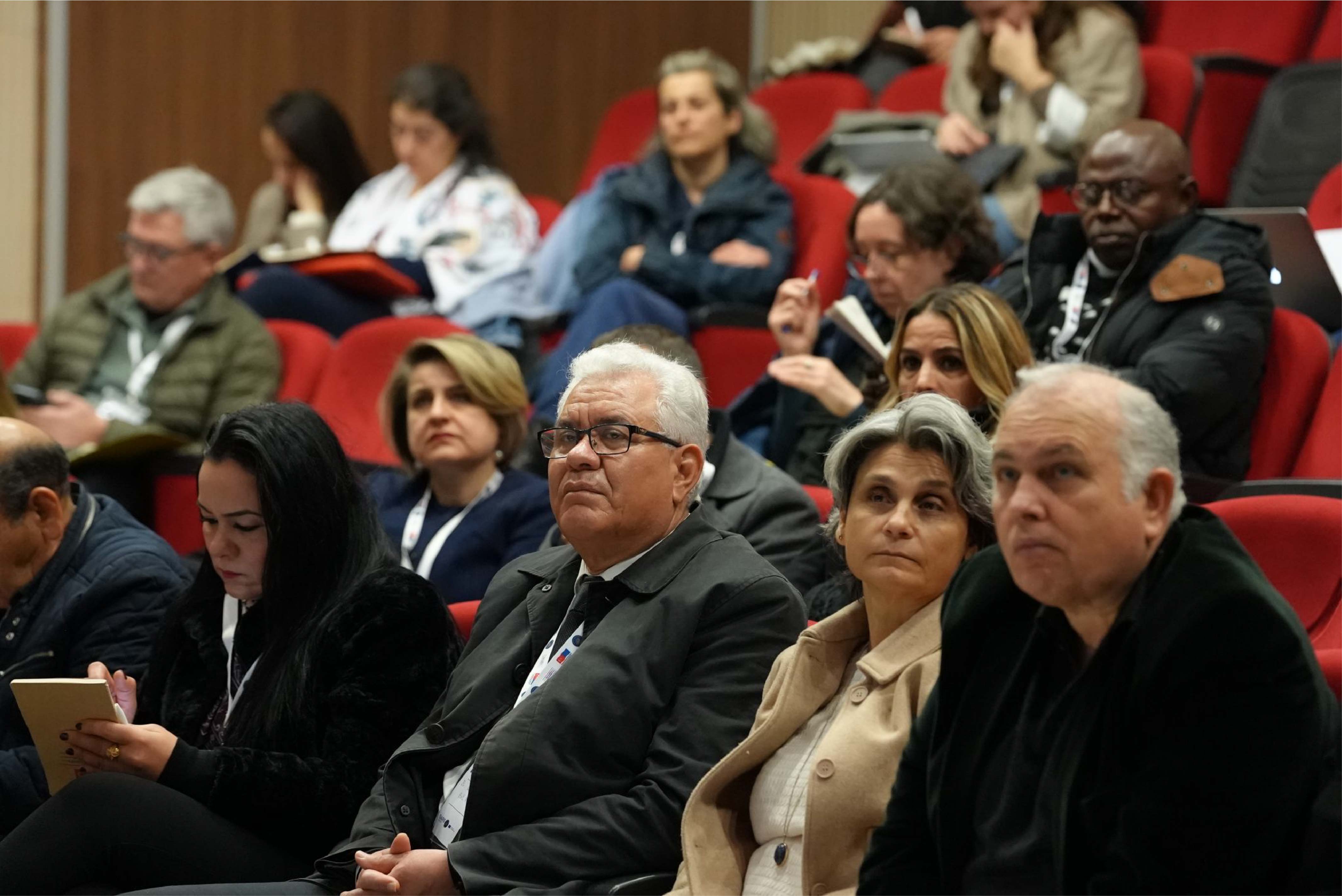 Conference attendees in a lecture theatre