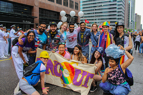 Group of students in EngOUT post at the Toronto Pride Parade
