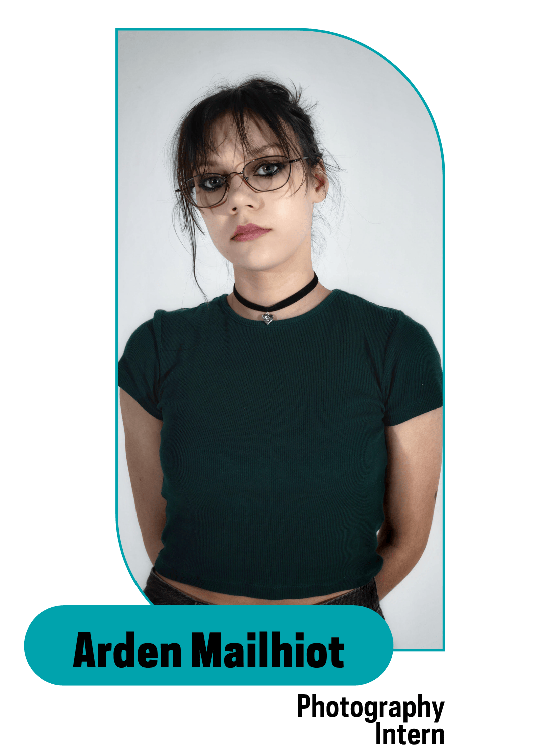 dark haired girl with glasses and dark clothing 