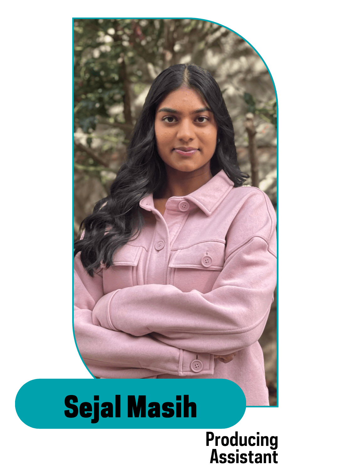 dark haired girl with pink clothing standing with her arms folded