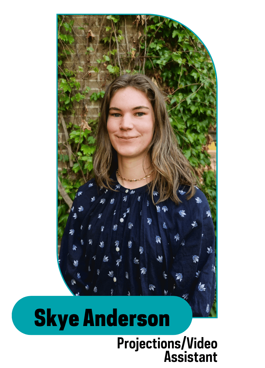 smiling girl standing outside wearing navy blue clothing