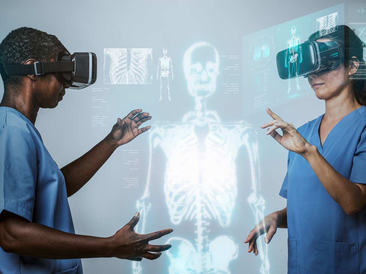 Doctors wearing VR simulation with hologram medical technology