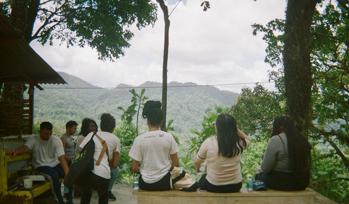 Black students overlooking a mountain in Panama. 