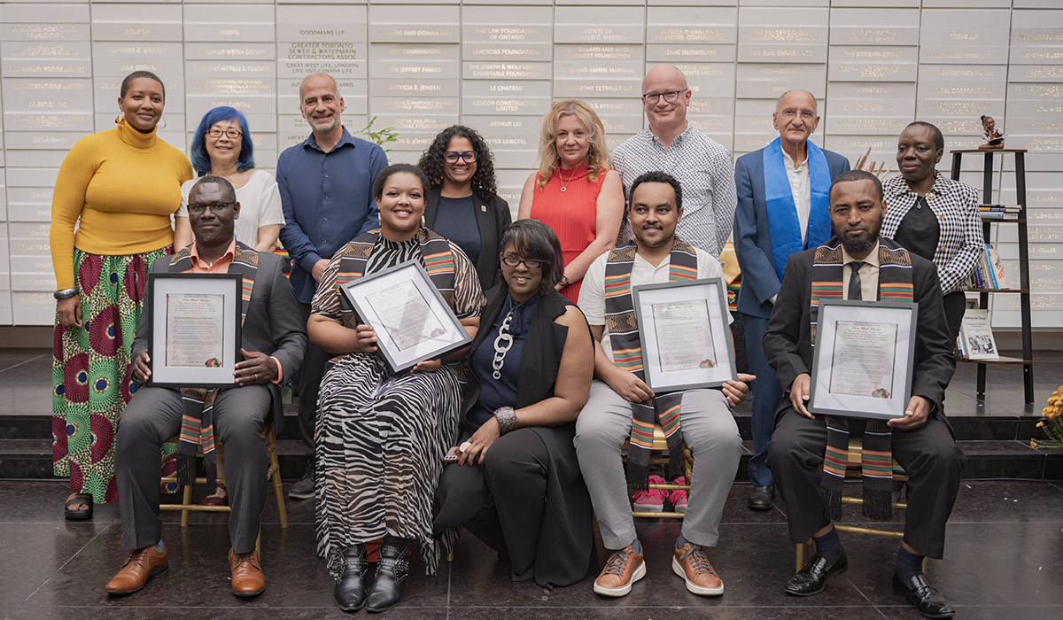 PICCABR executive co-chairs and chairs, Black fellows and their supervisors posing with certificates the launch of the Black Postdoctoral Fellowship. 