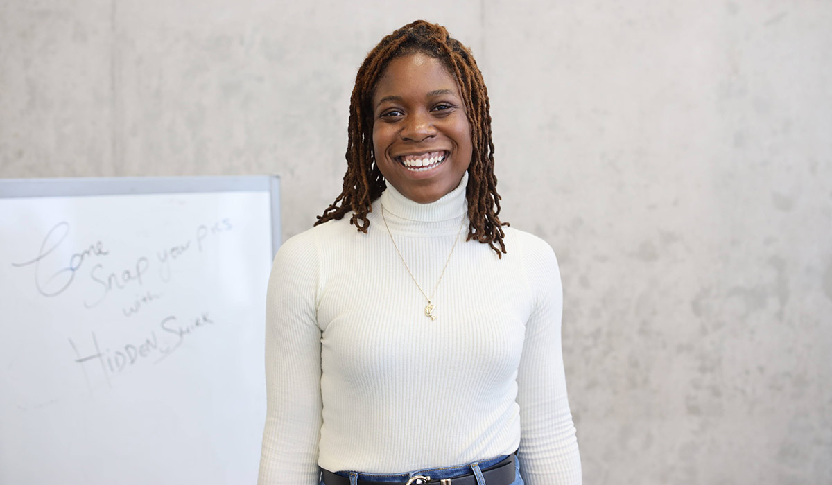 Eboni Morgan, former Black Student Support Facilitator, smiling.