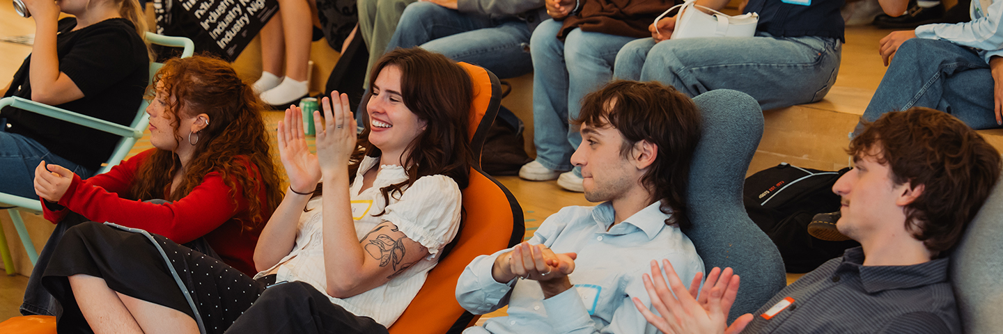 Students interacting in a creative showcase