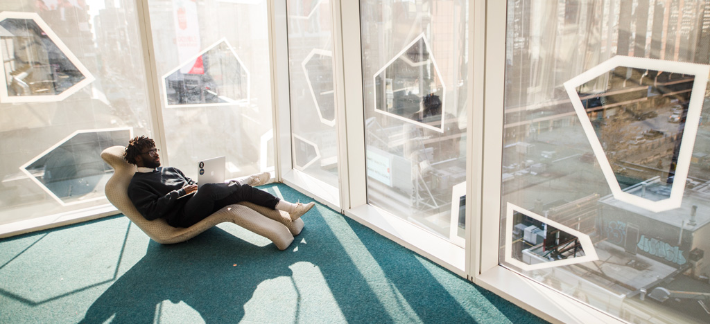 Computer science student resting in Ryerson SLC