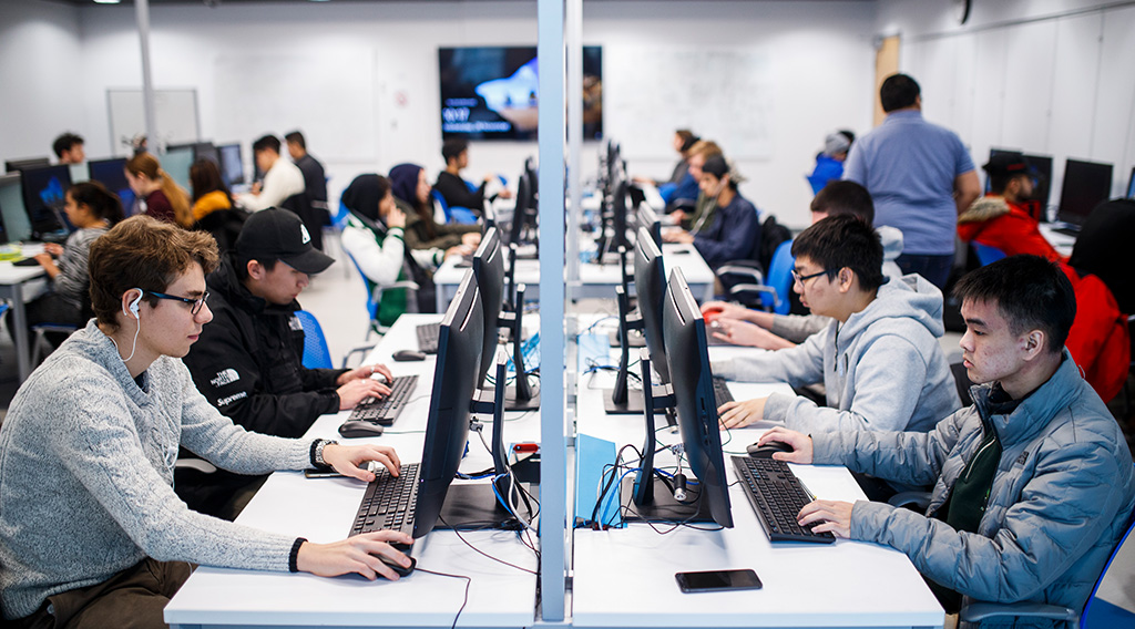 Students working on computers in a lab