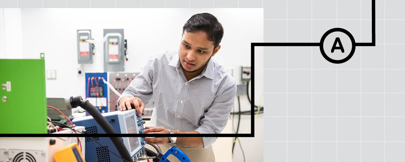 A male researcher is focused on an electrical project and is adjusting the knobs.