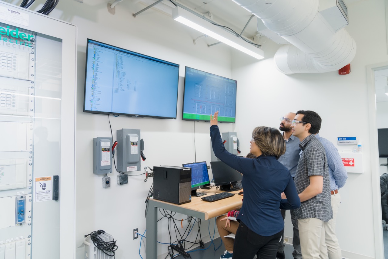 Researchers in an energy lab