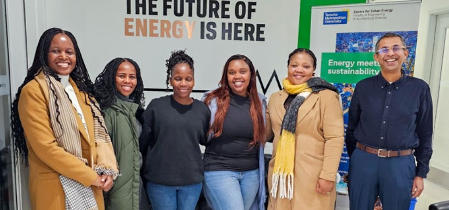 Team members side-by-side in event