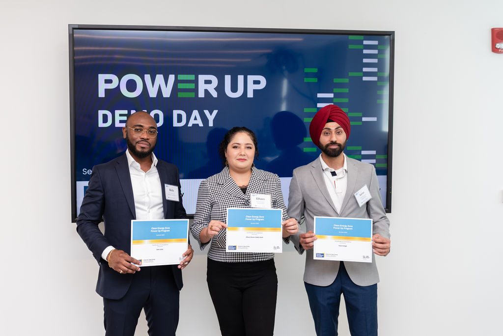 Power Up Program participants Bofa Udisi, Elham Shams Zadeh Amiri, and Karan Singh after presenting at the Power Up Demo Day. 