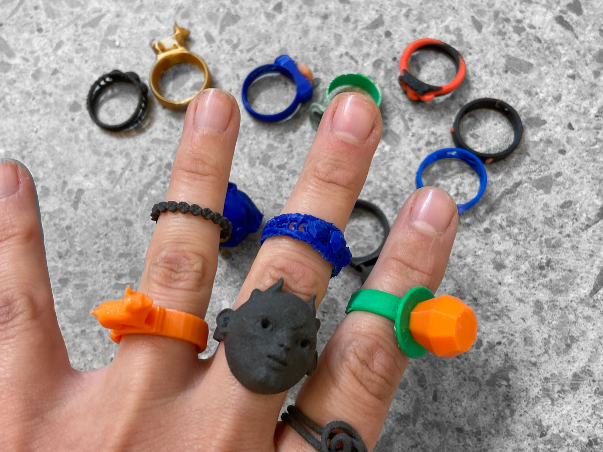 a collection of custom colourful plastic rings 