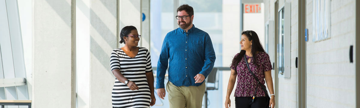 Three employees at TMU