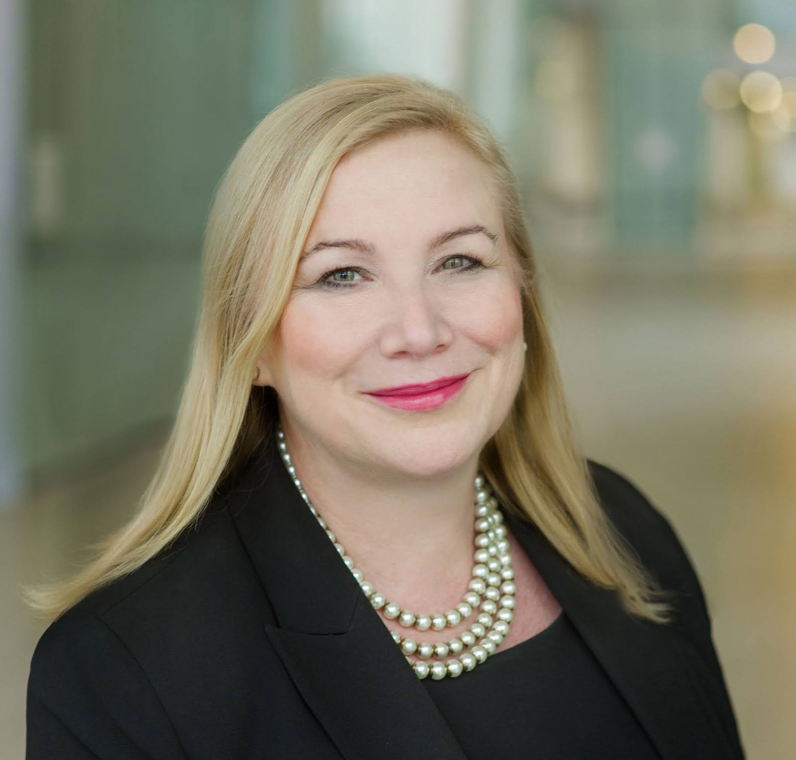 Dr. Wendy Cukier in business attire smiling