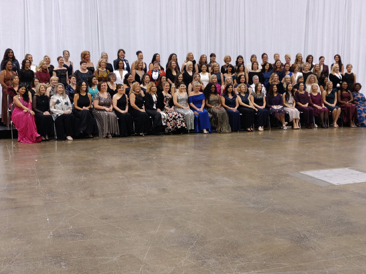 women all sitting in rows