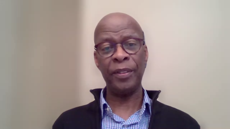 A screenshot of Dr. Carl James speaking during the workshop on Zoom
