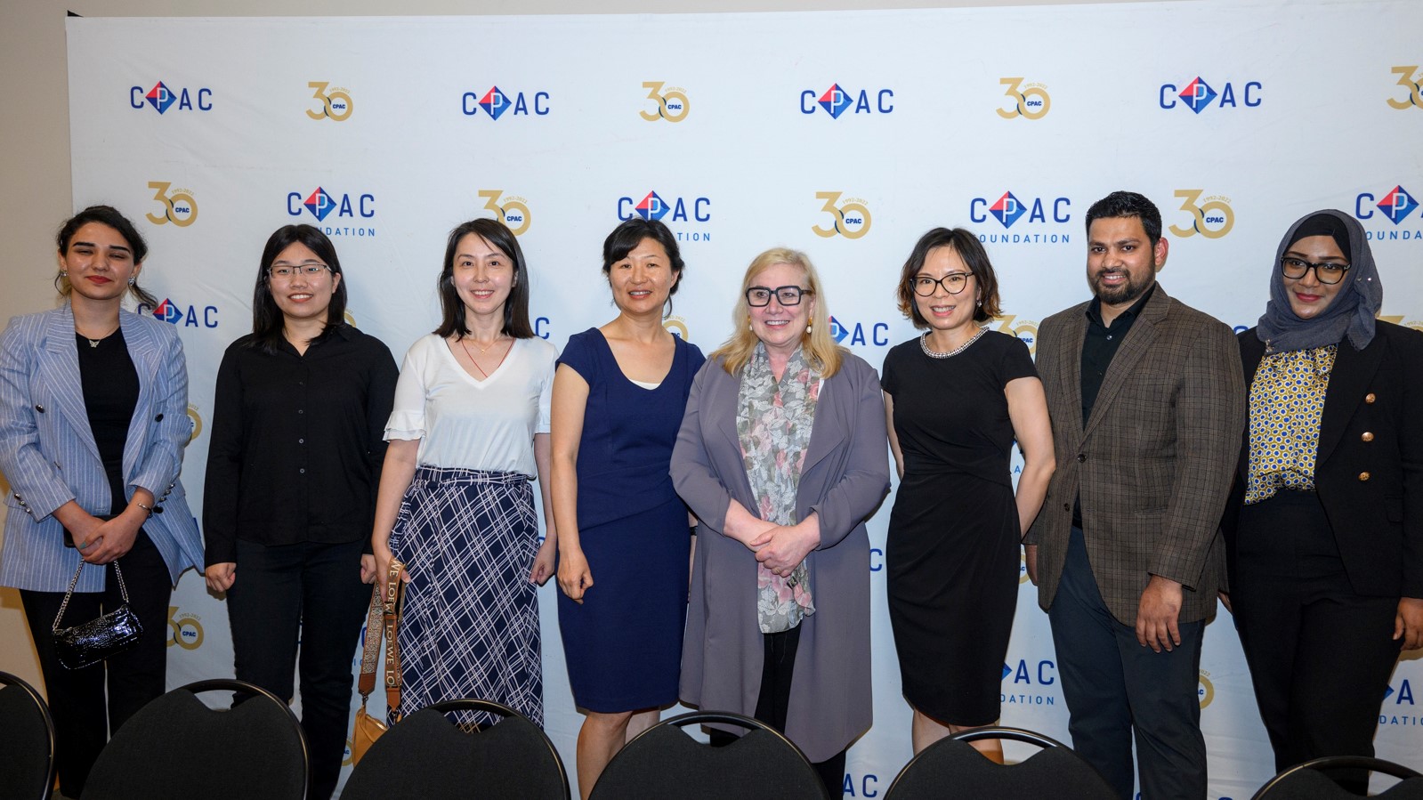 Wendy Cukier and other professionals pose for a photo at the award ceremony.