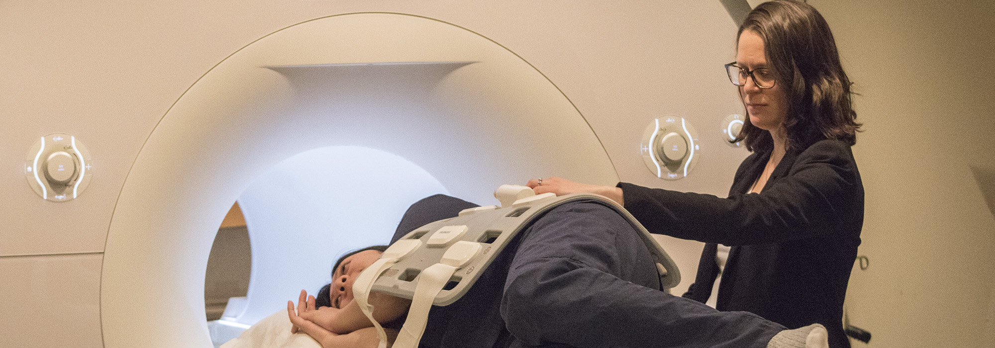 Dafna Sussman prepares a patient for an MRI