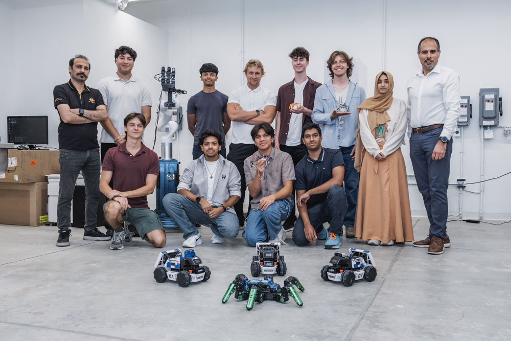 ELIXIR Lab Team photo with robotics