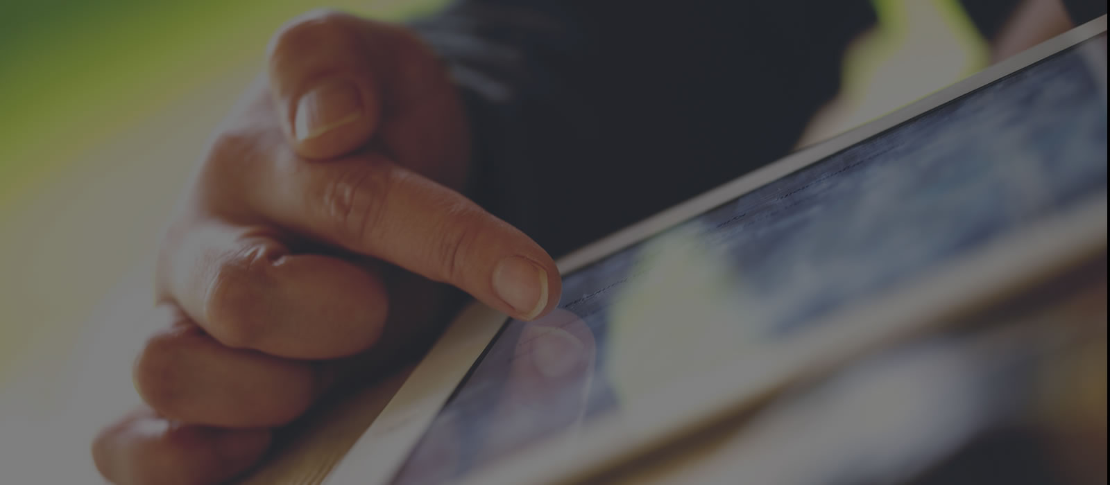 An individual using a tablet