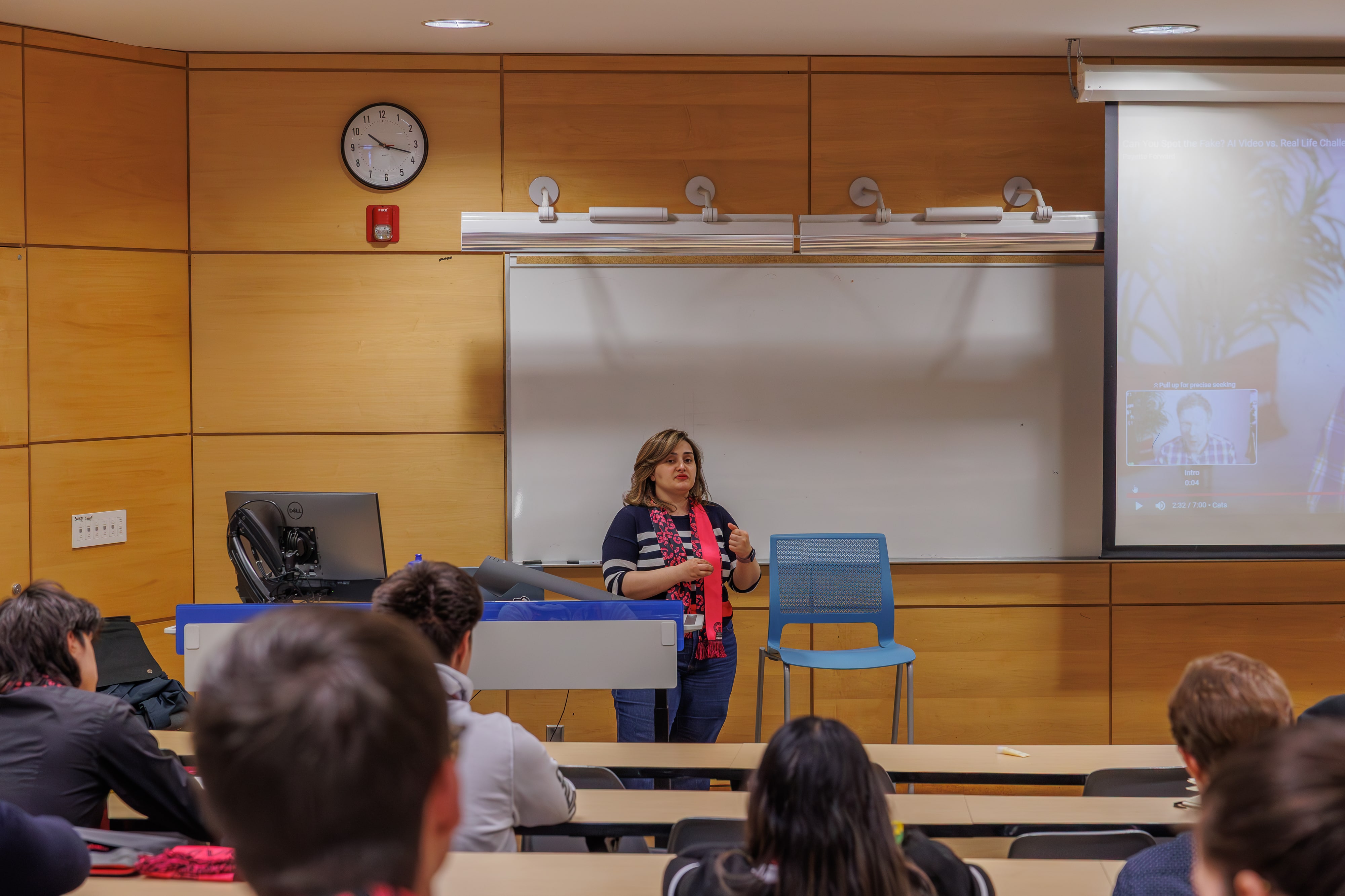 PhD candidate Yasaman Ahmadiadl teaching his workshop as students listen