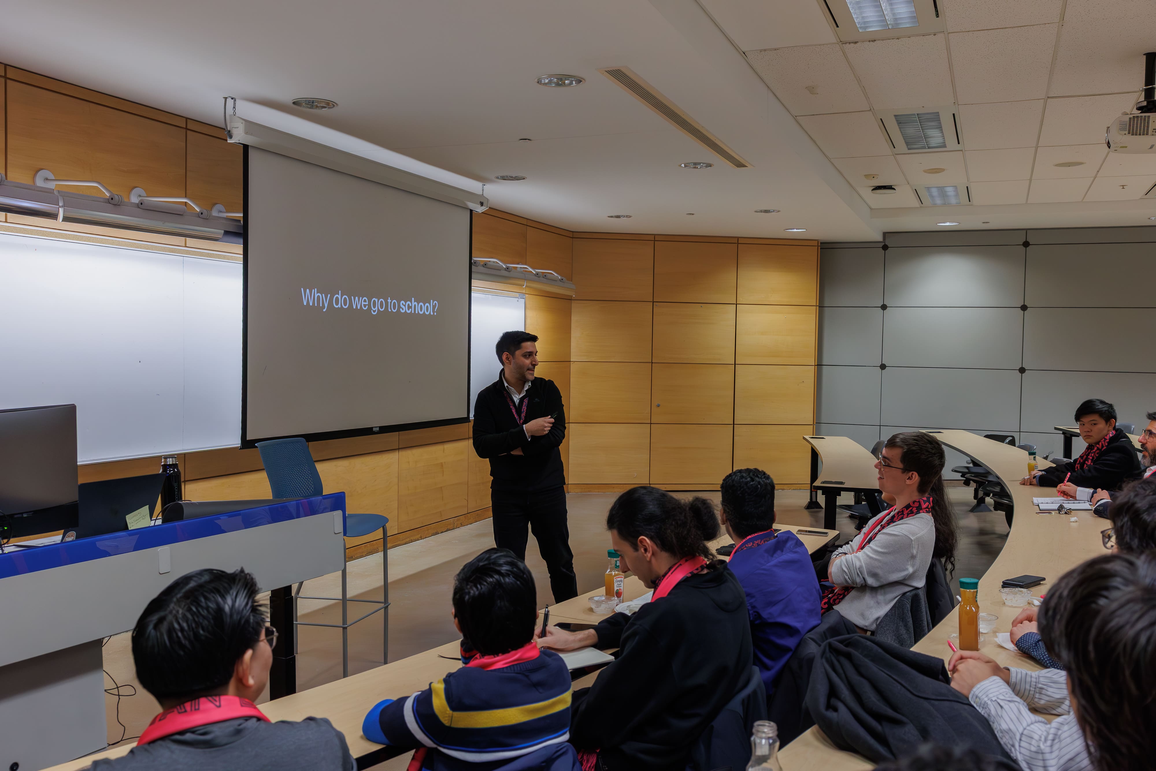 Ashu Syal teaching his workshop as students listen