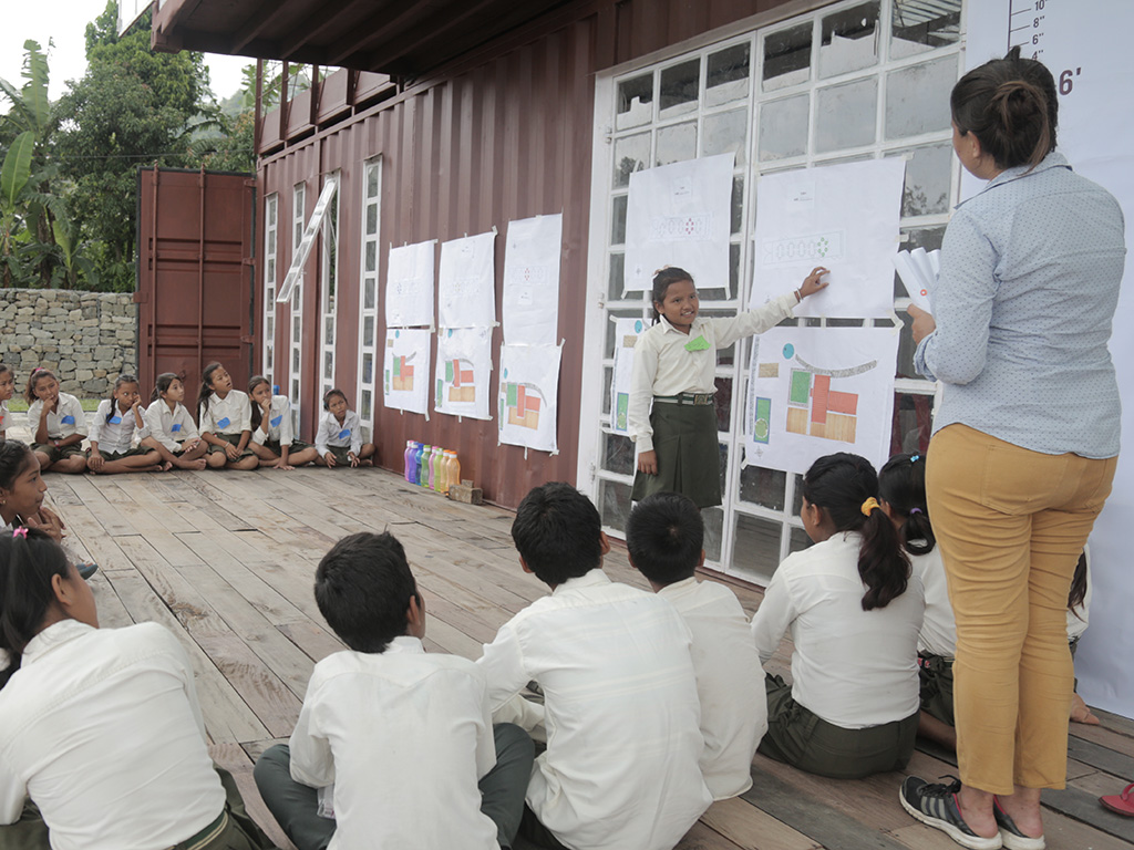 Architectural science alumna Priyanka Bista facilitates an outdoor class for sixth-grade students