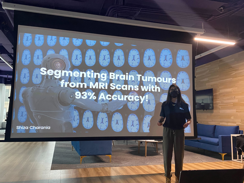 Shiza presenting her biomedical research at The Knowledge Society.