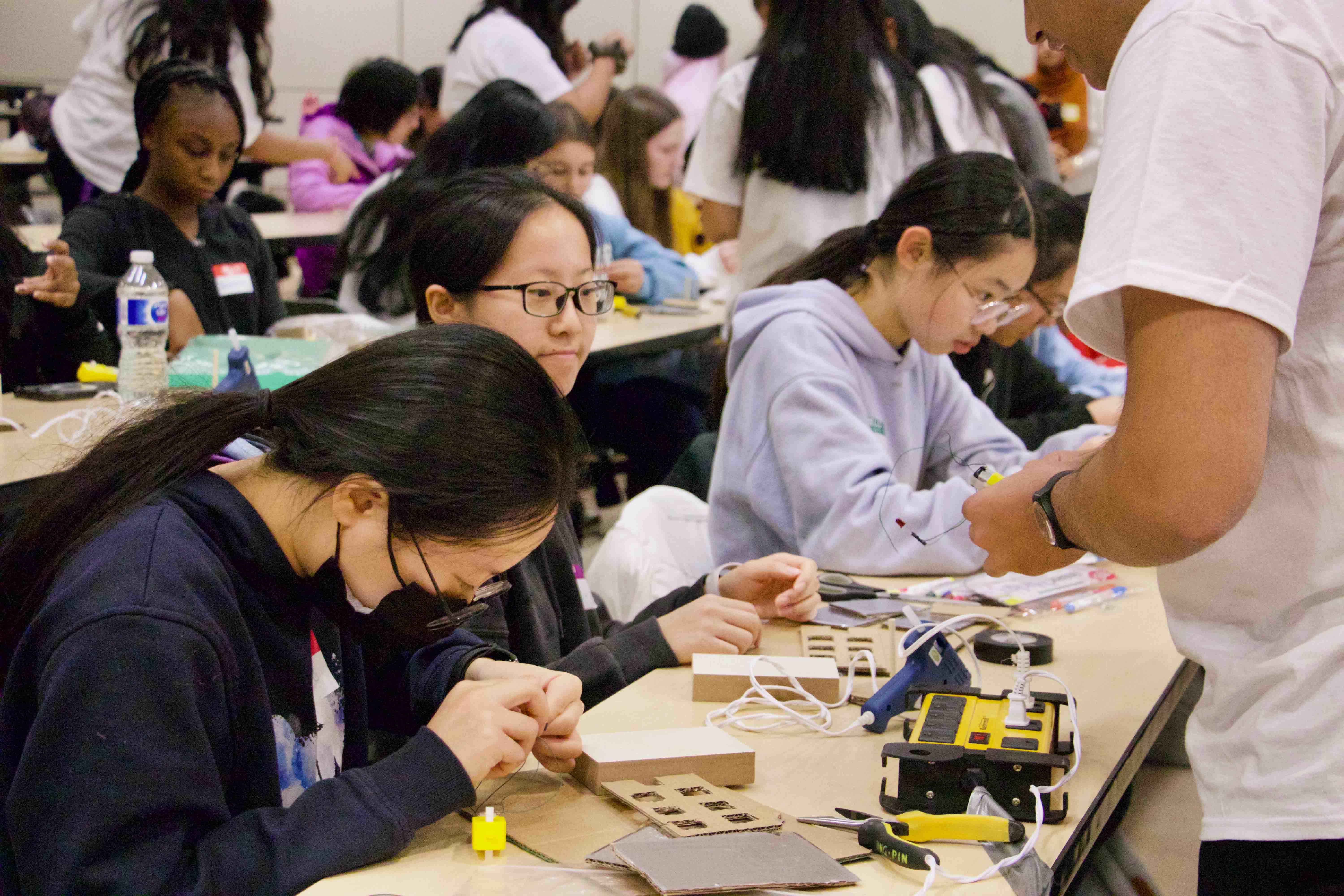 students working on machinery