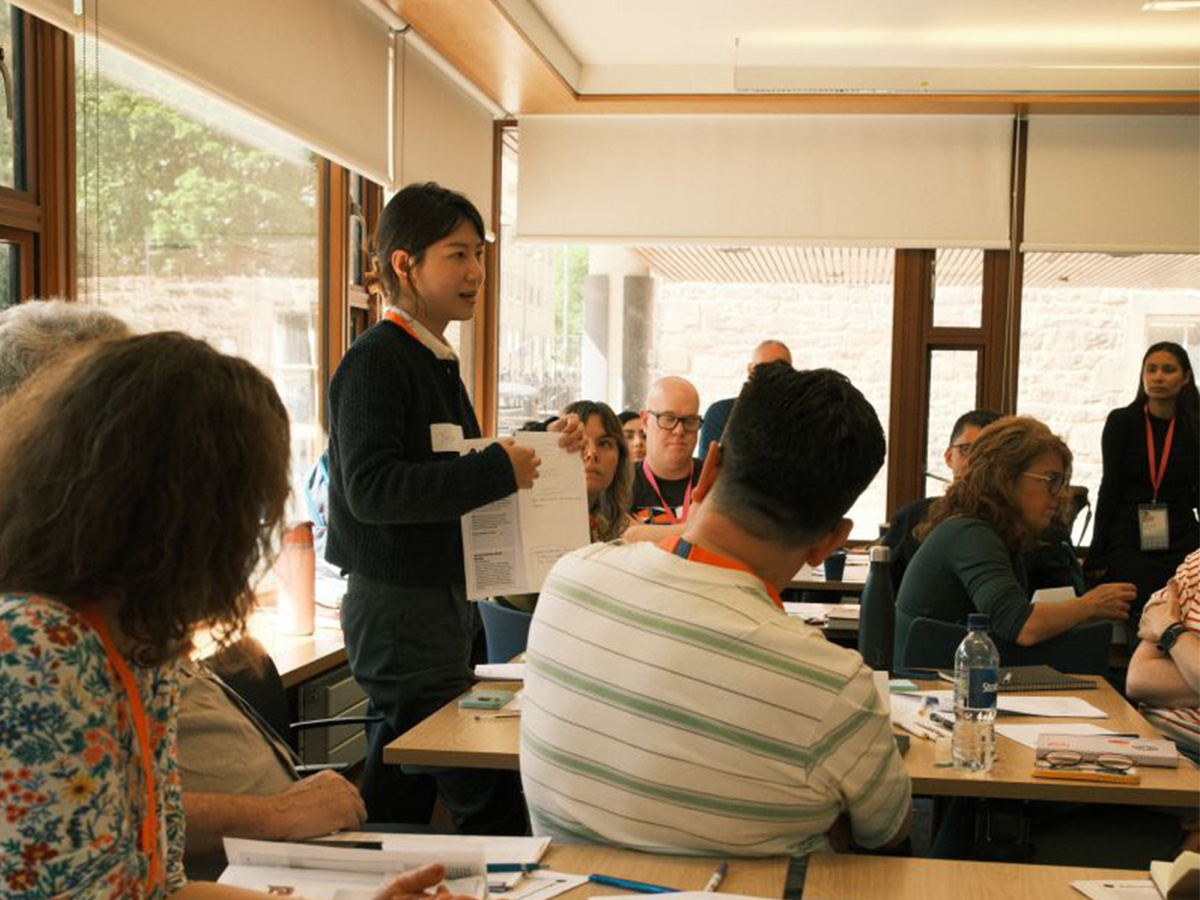 Yaxin Jiang presenting findings from a small group workshop at an exploration session at the DRS conference.