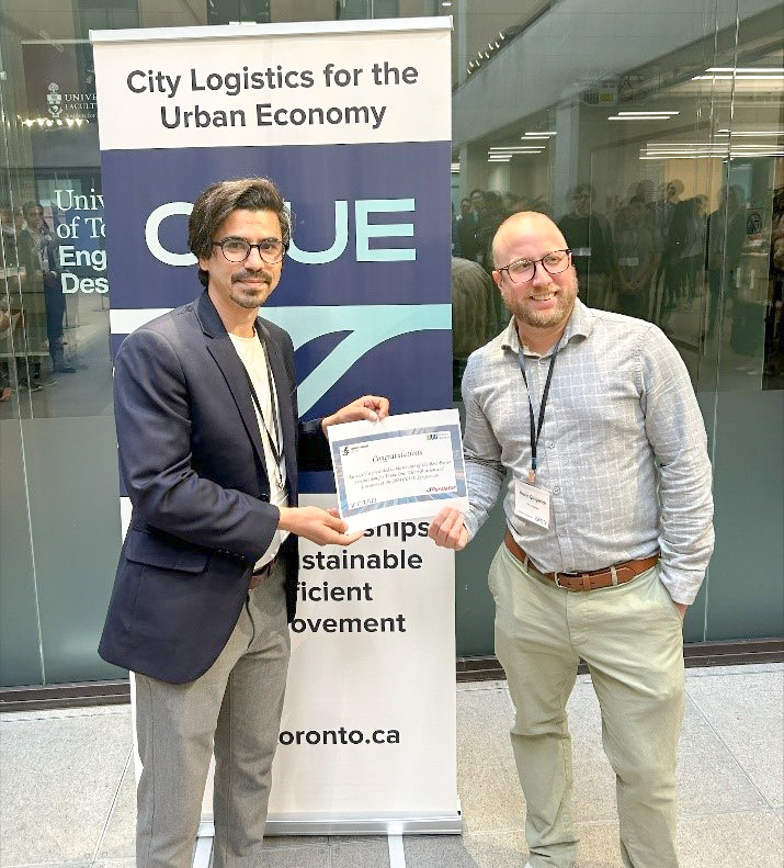 Tareq Alsaleh receiving an award certificate. 