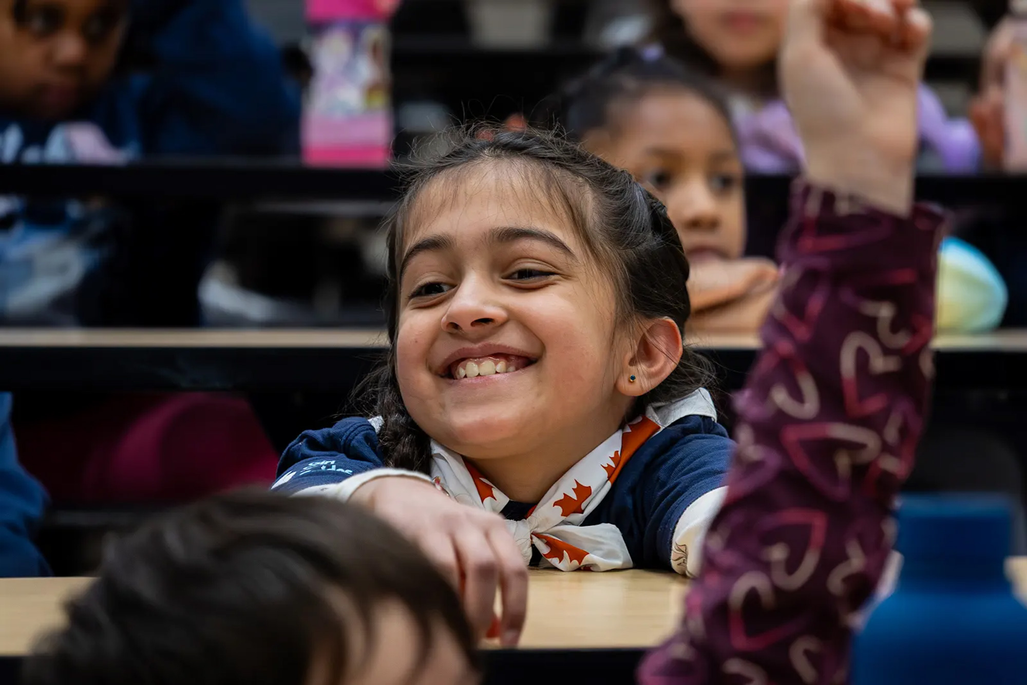 Smiling Girl Guide at event.