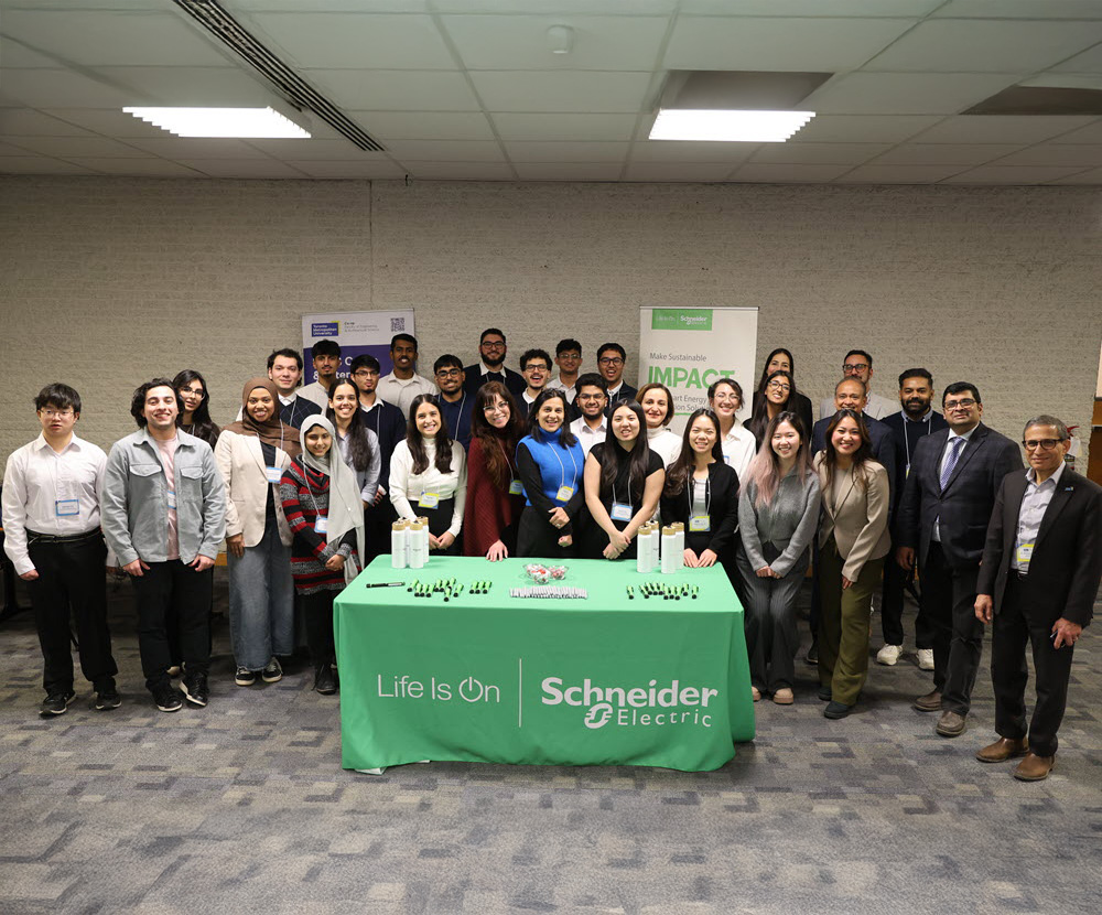 Group of FEAS students, faculty, and Schneider Electric mentors at the Sustainability Accelerator showcase.