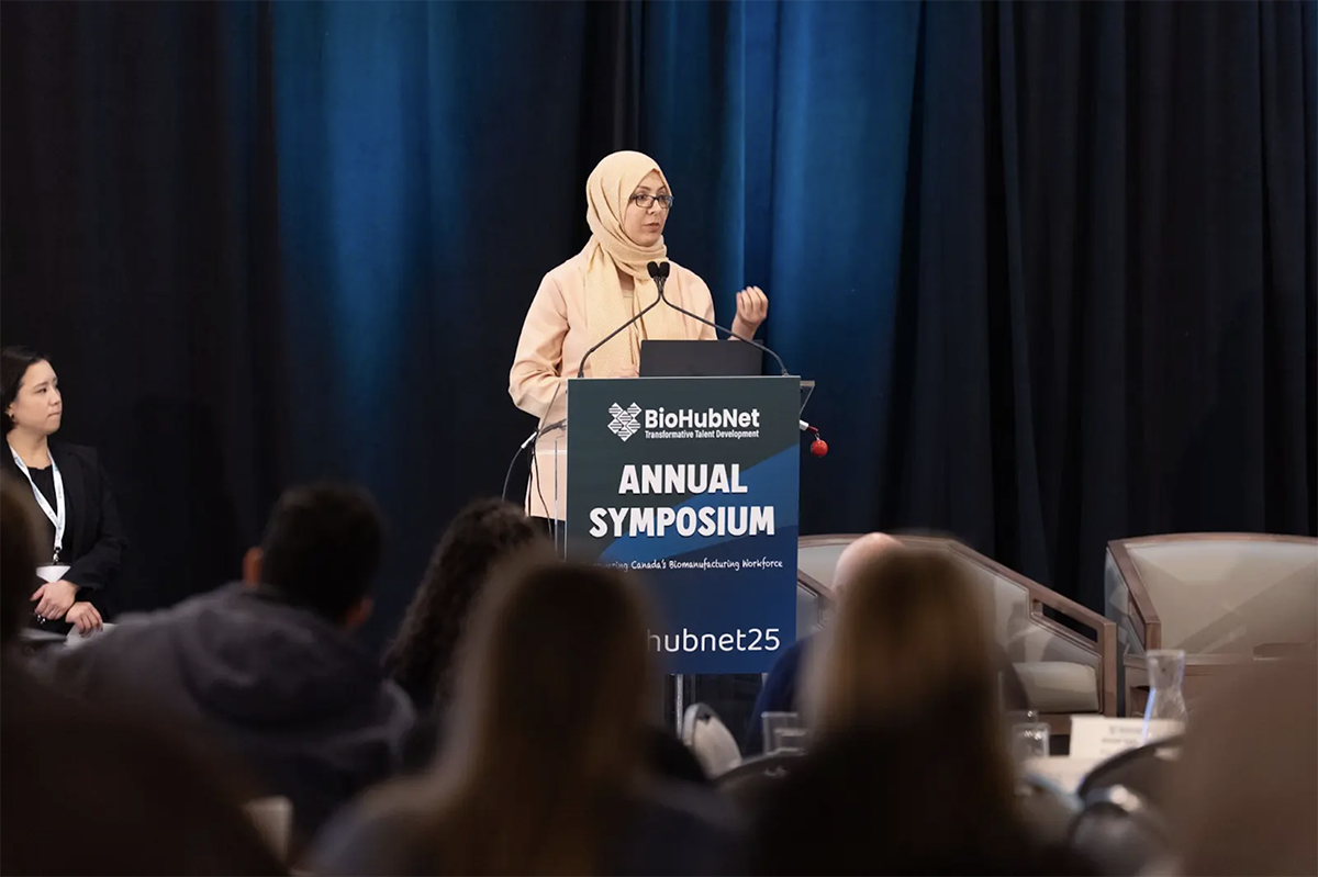 Dr. Narjes Allahrabbi speaking at a conference.
