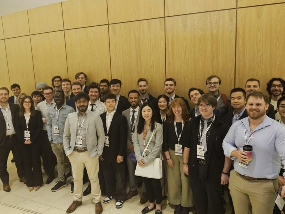 Group of smiling researchers and experts at the 2026 Canadian Nuclear Society Annual Conference.