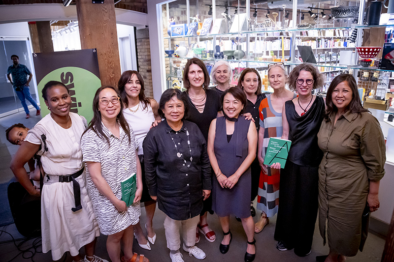 The authors of Women Changing Architecture posing with some of the featured architects at Swipe Design.