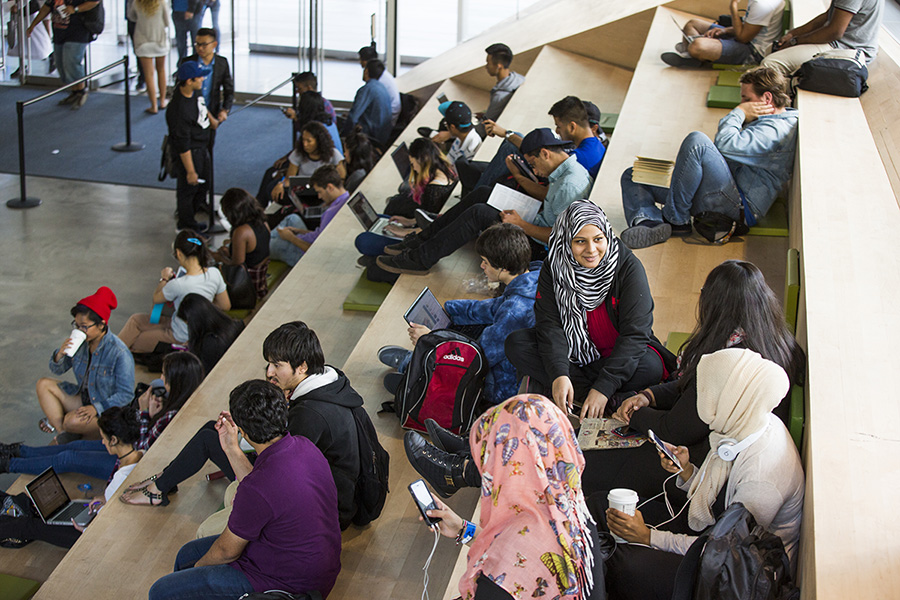 A group of students sitting and chatting in the SLC