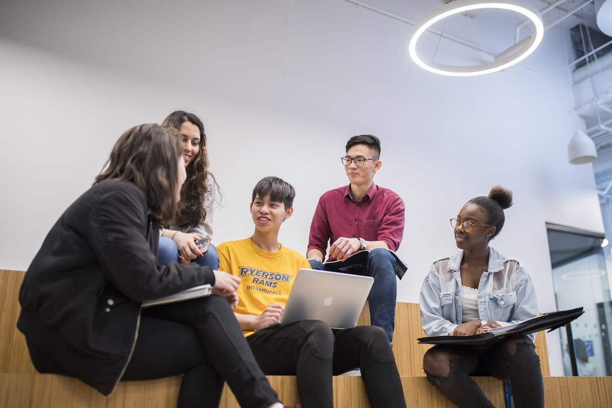 Group of students in the ELI lounge engaged in conversation